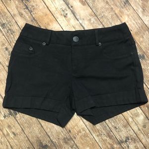 Never worn, black stretch shorts